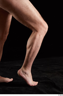 Spencer  1 calf flexing nude side view 0008.jpg